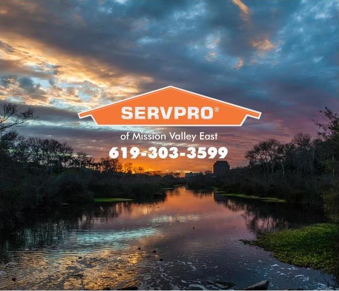 The San Diego River in Mission Valley at sunset is shown. 