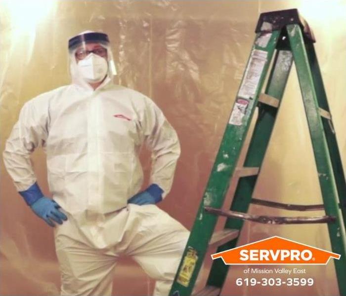 A technician is preparing a room for mold containment. 