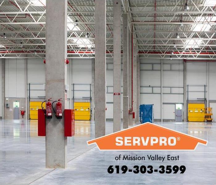 A sparkling clean commercial warehouse is shown empty and ready for business.  